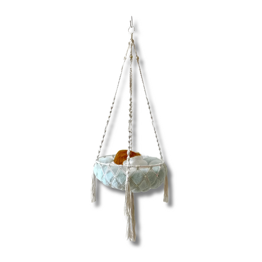 The MATE Macrame Cat Hammock is designed to offer a unique blend of elegance and functionality.